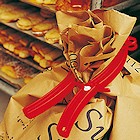Sack grippers for bakery